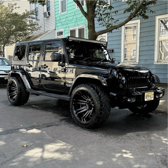 Black Jeep just detailed on side of road