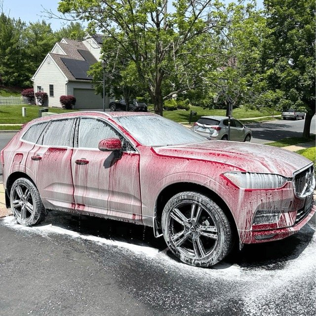 Volvo getting detailed in driveway